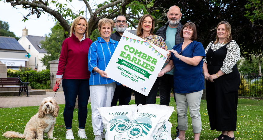The Mayor of Ards and North Down, Councillor Gillian McCollum, with Tracey Burrows (Comber Chamber of Commerce Committee Representative) and other local business participants who are involved in the Comber Earlies Festival Passport, Saturday 28 June 2025, 11am – 5pm. Image: Graham Baalham-Curry.